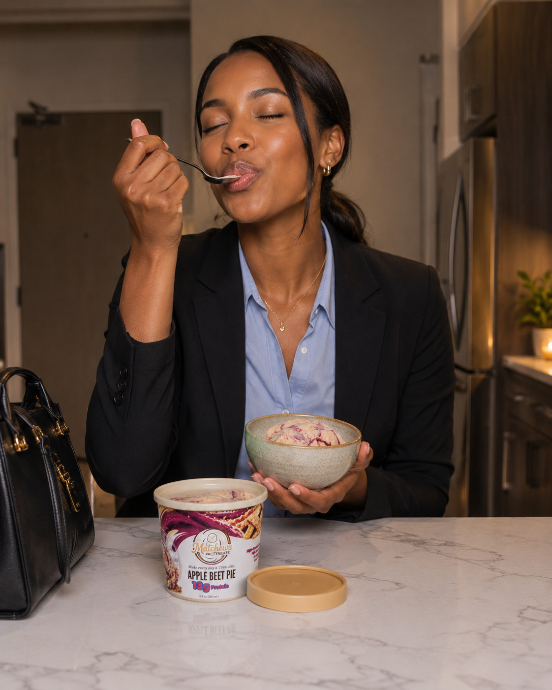 Woman in the kitchen enjoying a healthy lifestyle moment with Matchews Pro-Treats
